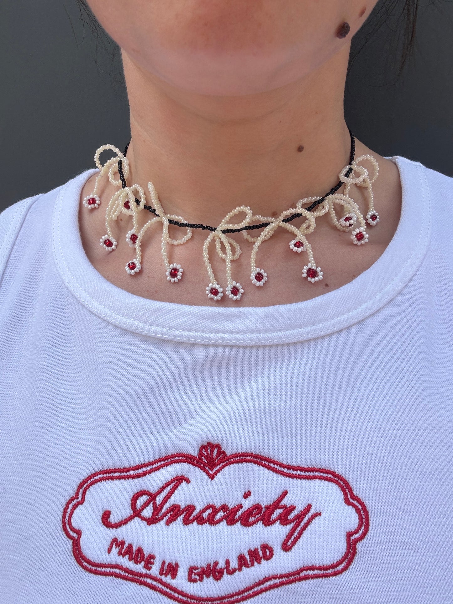 YONA KOHEN BALLERINA BOW NECKLACE IN BLACK