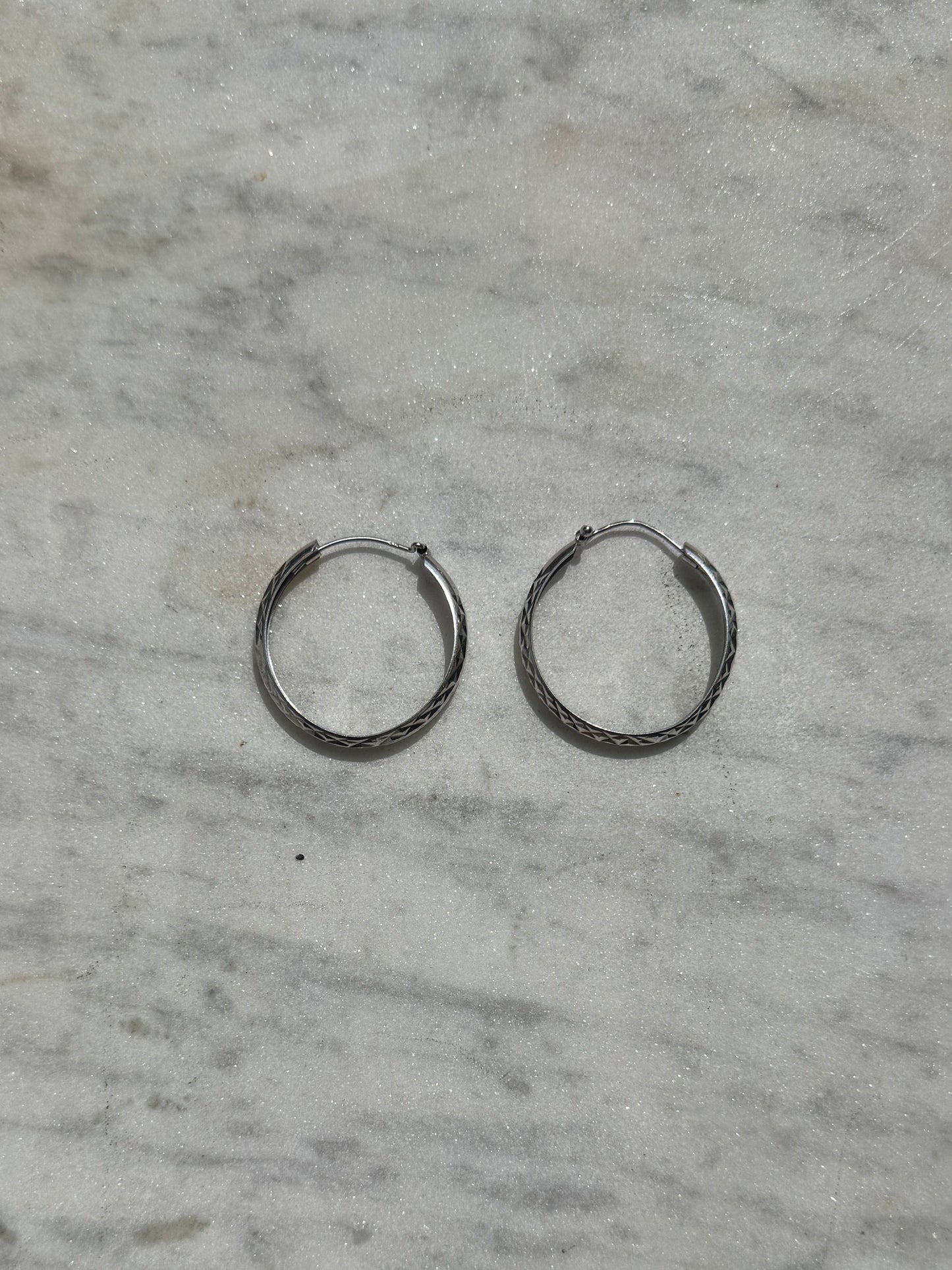 SACROSANCT CIRCULAR TEXTURED HOOPS