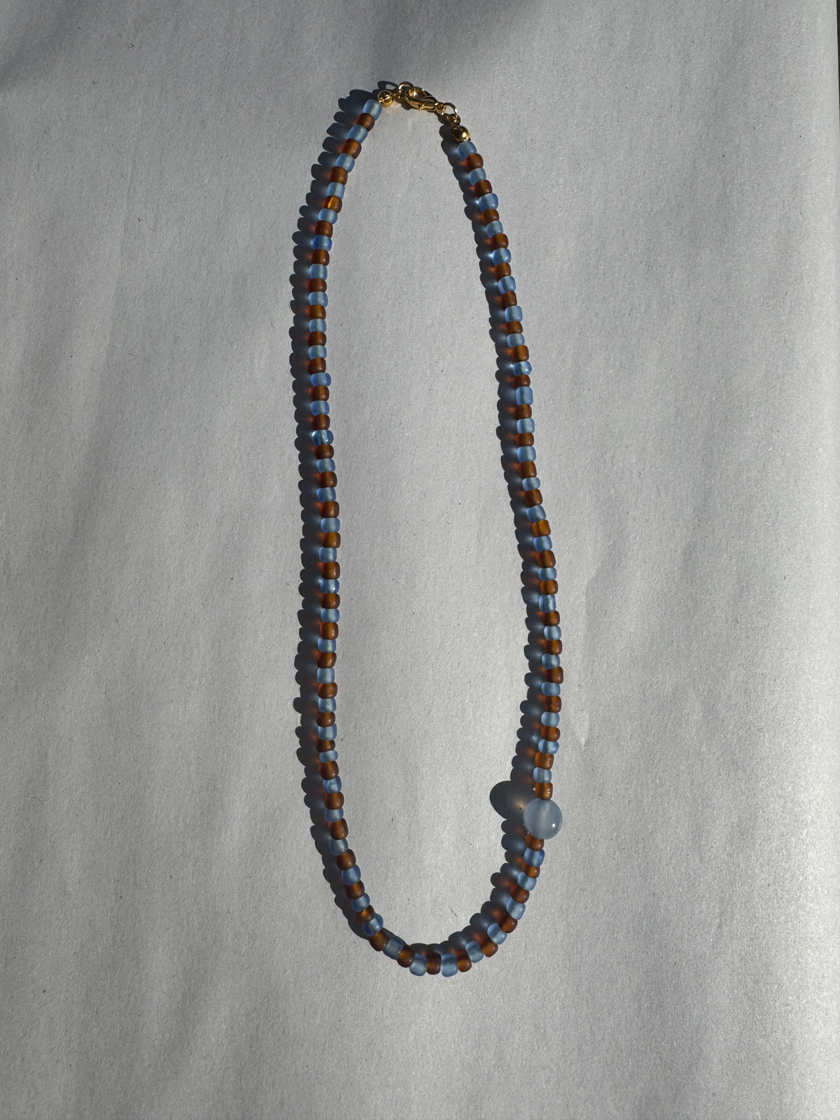 BEADING FOR PALESTINE STRIPE NECKLACE BLUE & BROWN
