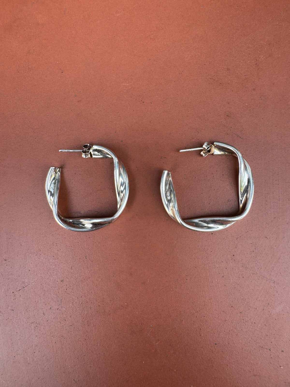 SACROSANCT SCULPTURAL TWISTED HOOPS