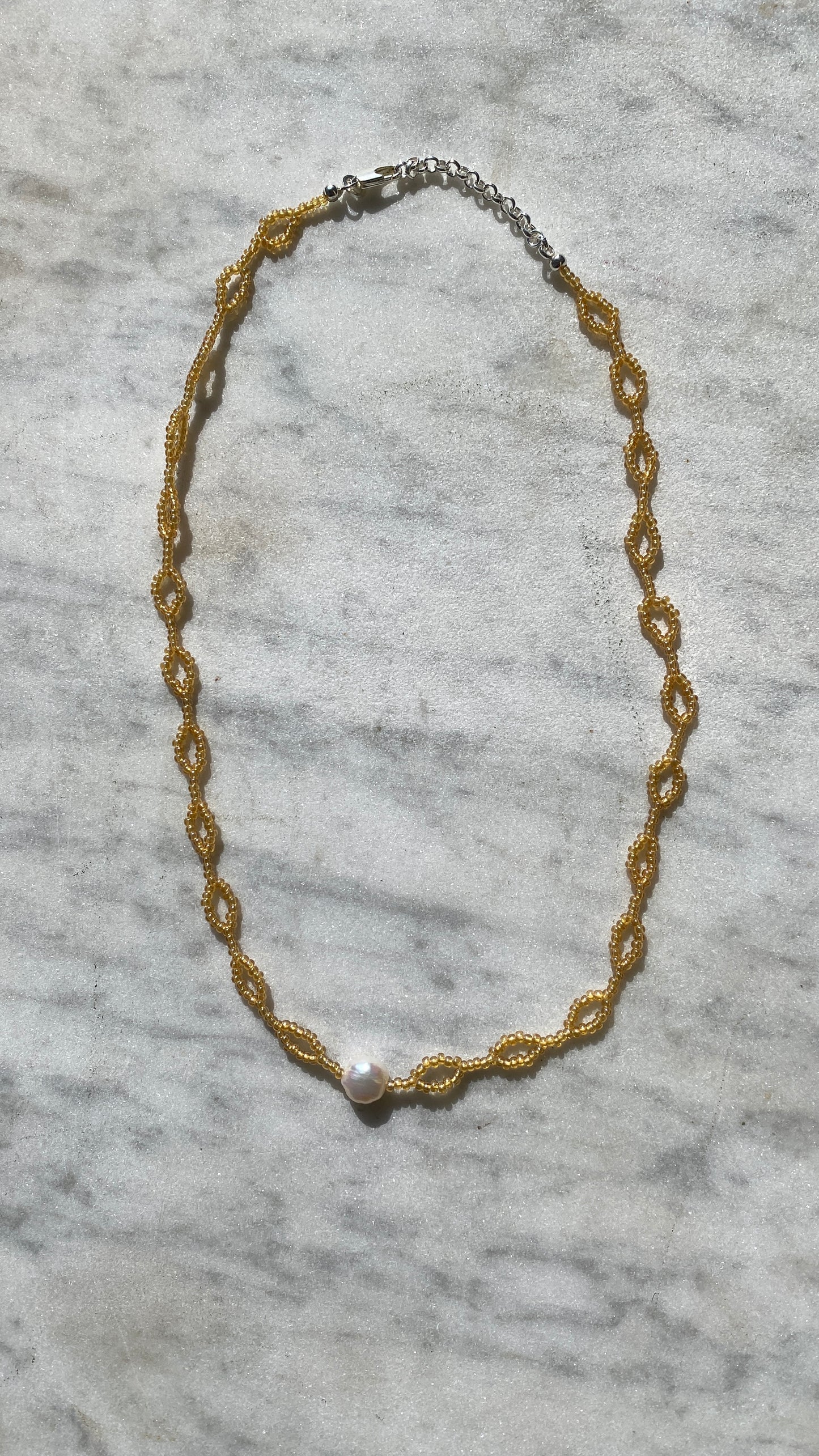 YONA KOHEN SIROCCO LOOP NECKLACE IN HONEY AND PEARL