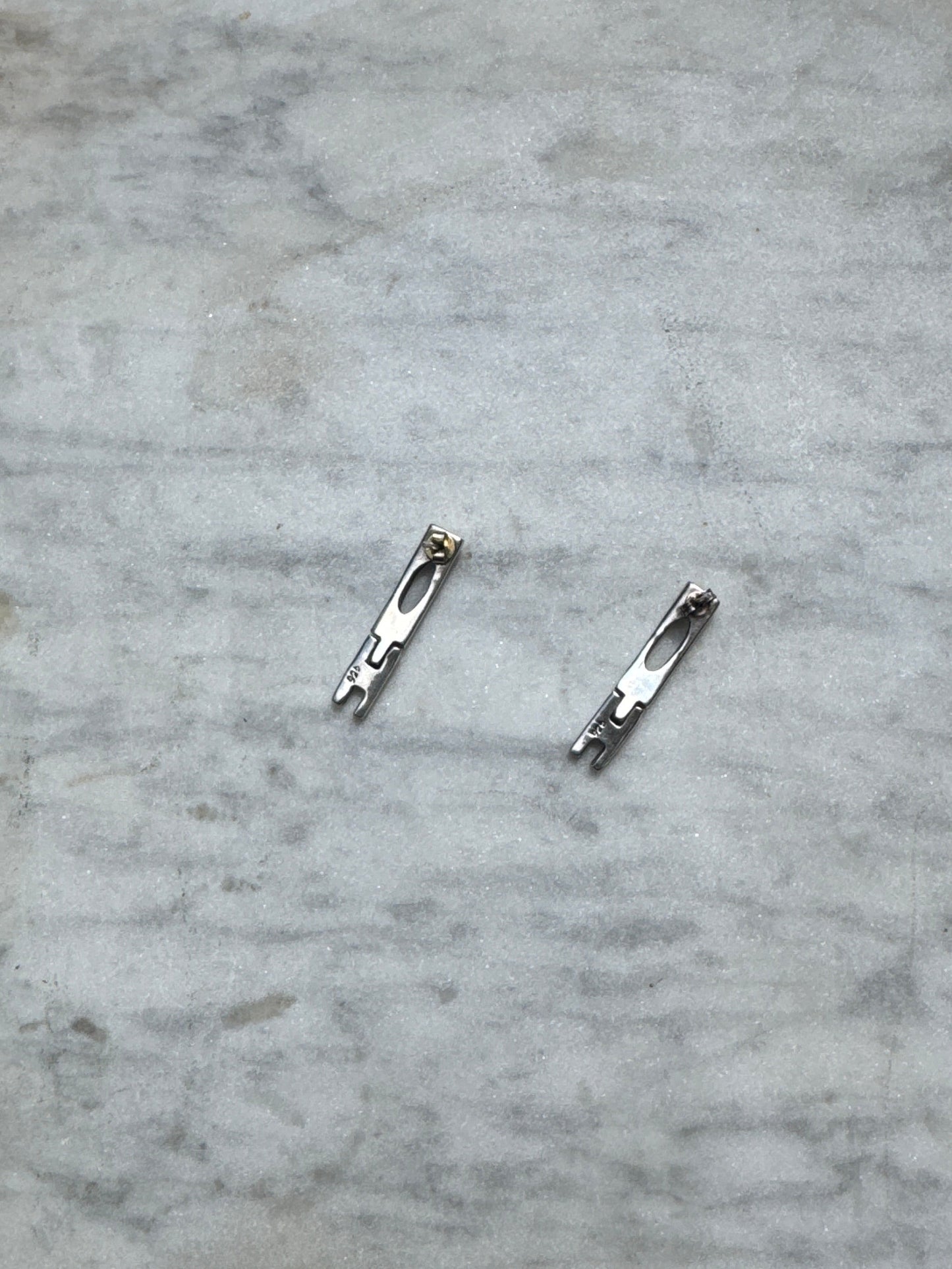 SACROSANCT GEO LONG STUDS