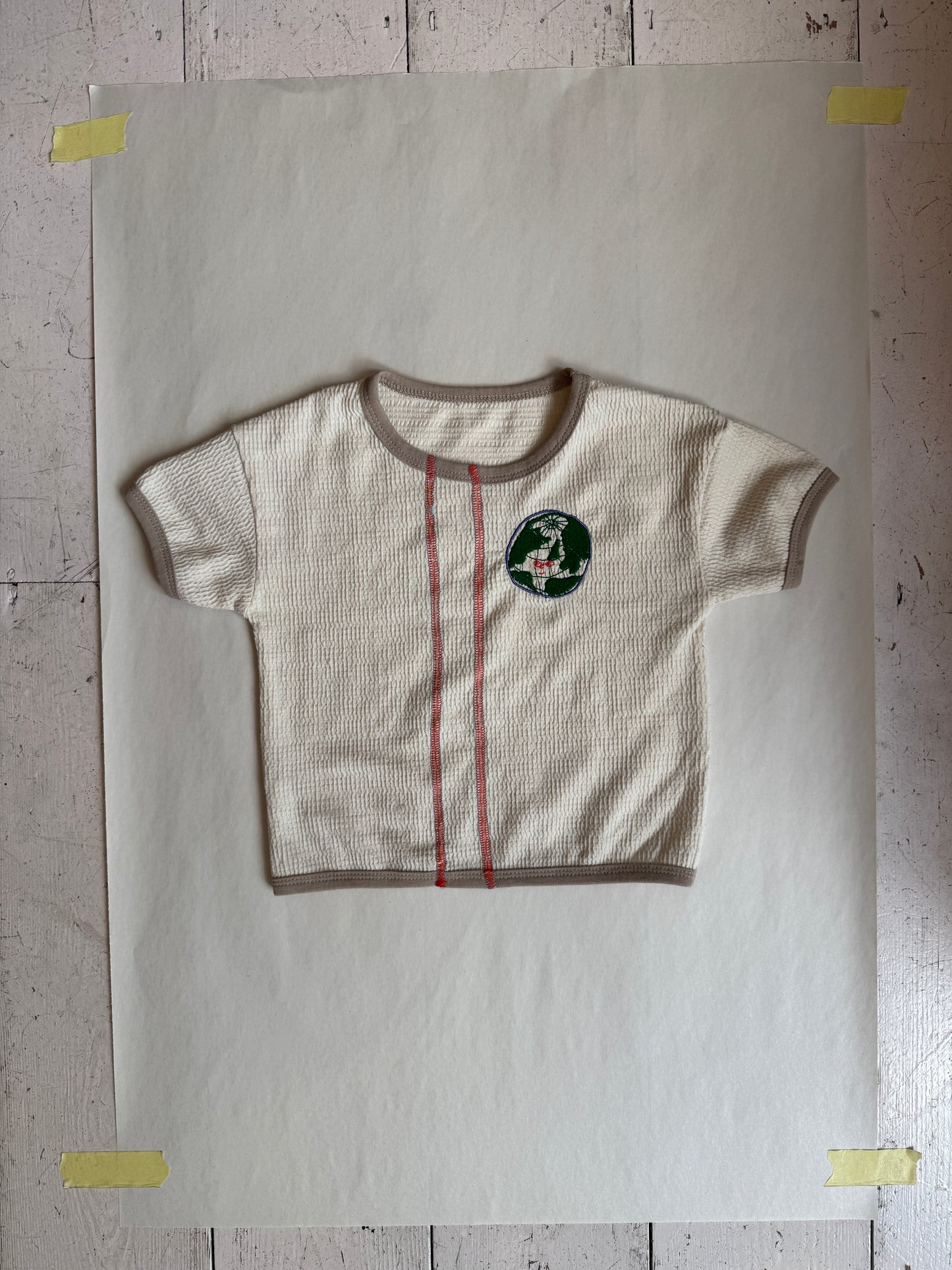 NO NEW TEE EARTH